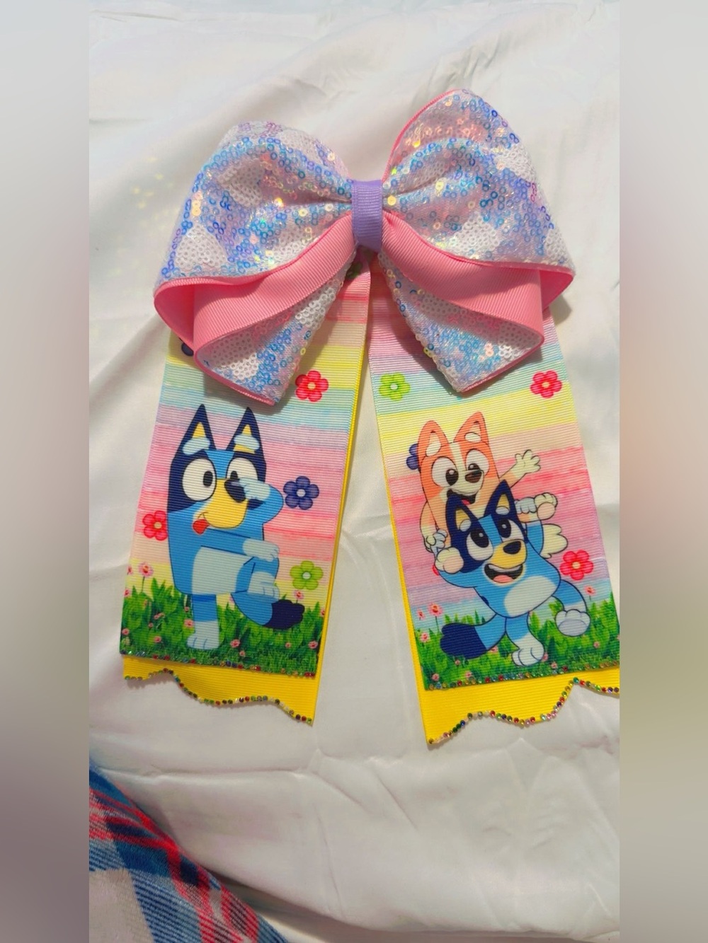The hair bows for girls are a good size and feature Bluey.